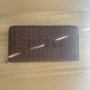GUESS - brown wallet - length 7-8in - width 4-5in